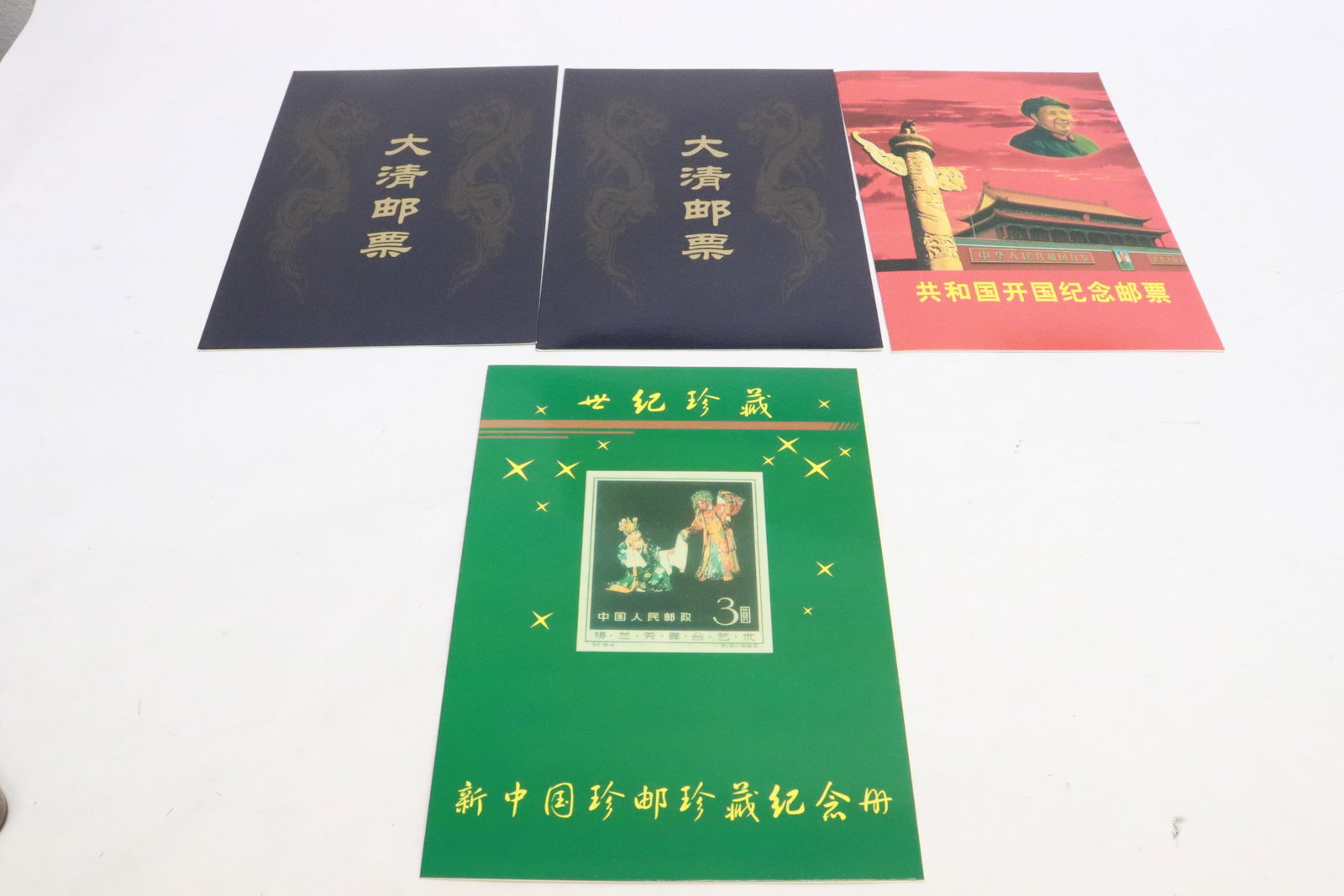4 packs of Chinese reproduction stamps: 4 packs of Chinese reproduction stamps, these are NOT real, the only serve for souvenir purposes