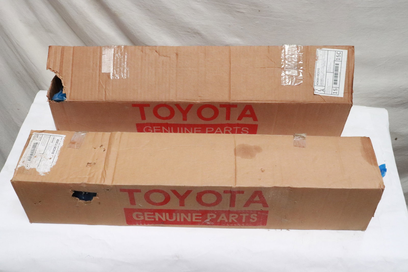 2 genuine Toyota parts: 2 genuine Toyota parts (27.5"L ea); "front drive CV axle shaft assembly" part #43430-0c010 for 2000-2006 Toyota Tundra, and 2001-2007 Toyota Sequoia, appear in new condition