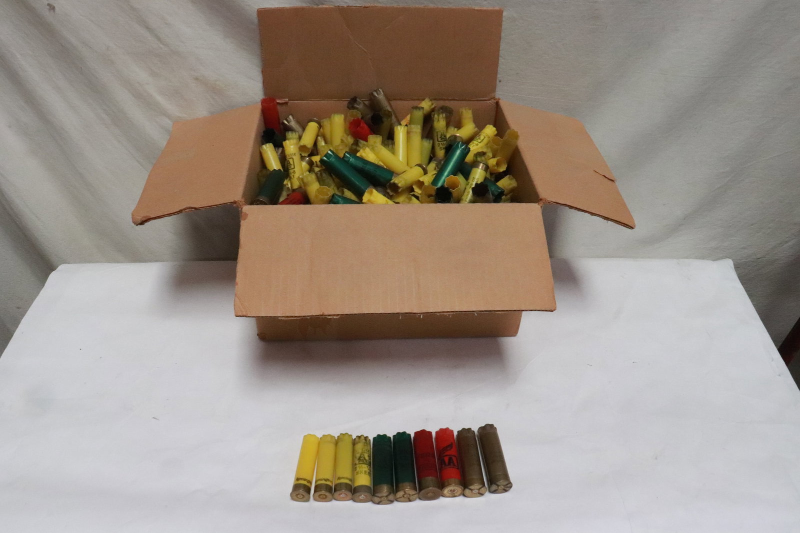 Over 350 12/20 gauge shotgun empty shells: Over 350 12/20 gauge shotgun empty shells, most by Remington