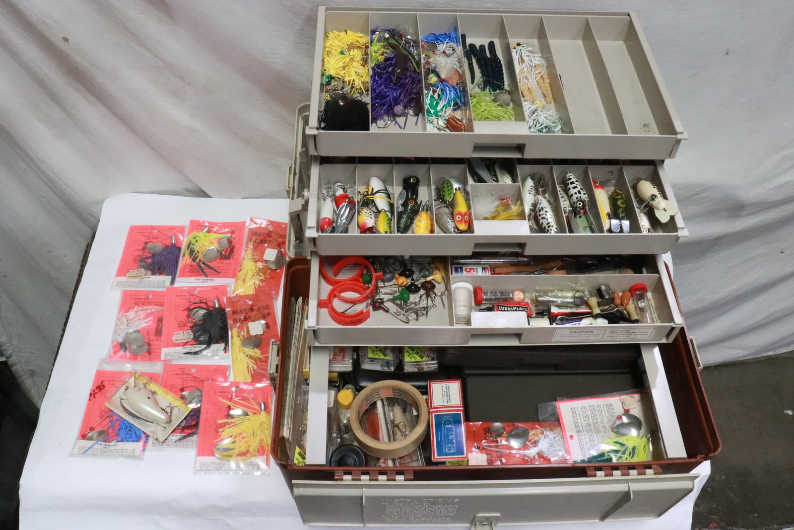 A large fishing tackle box with contents (1 of 13)