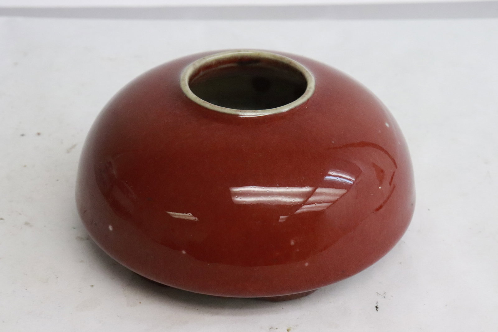 18th c. porcelain water dripper, Qianlong period: Fine 18th century red glazed porcelain water dripper, Qianlong period, 2.18"x4.3"dia