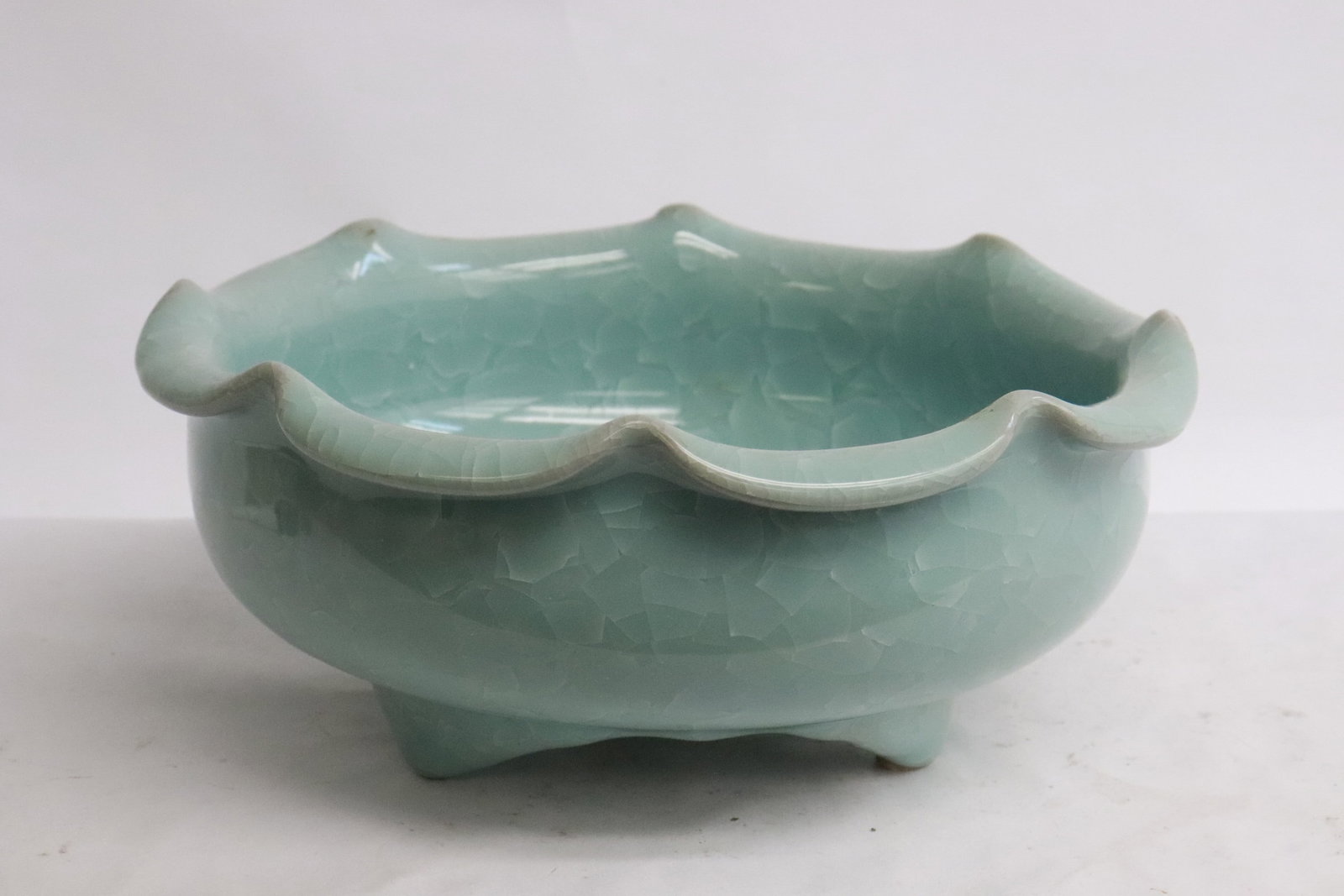 A celadon crackleware porcelain censer: A celadon crackleware porcelain censer with foliate edge, 4"x9.1"dia