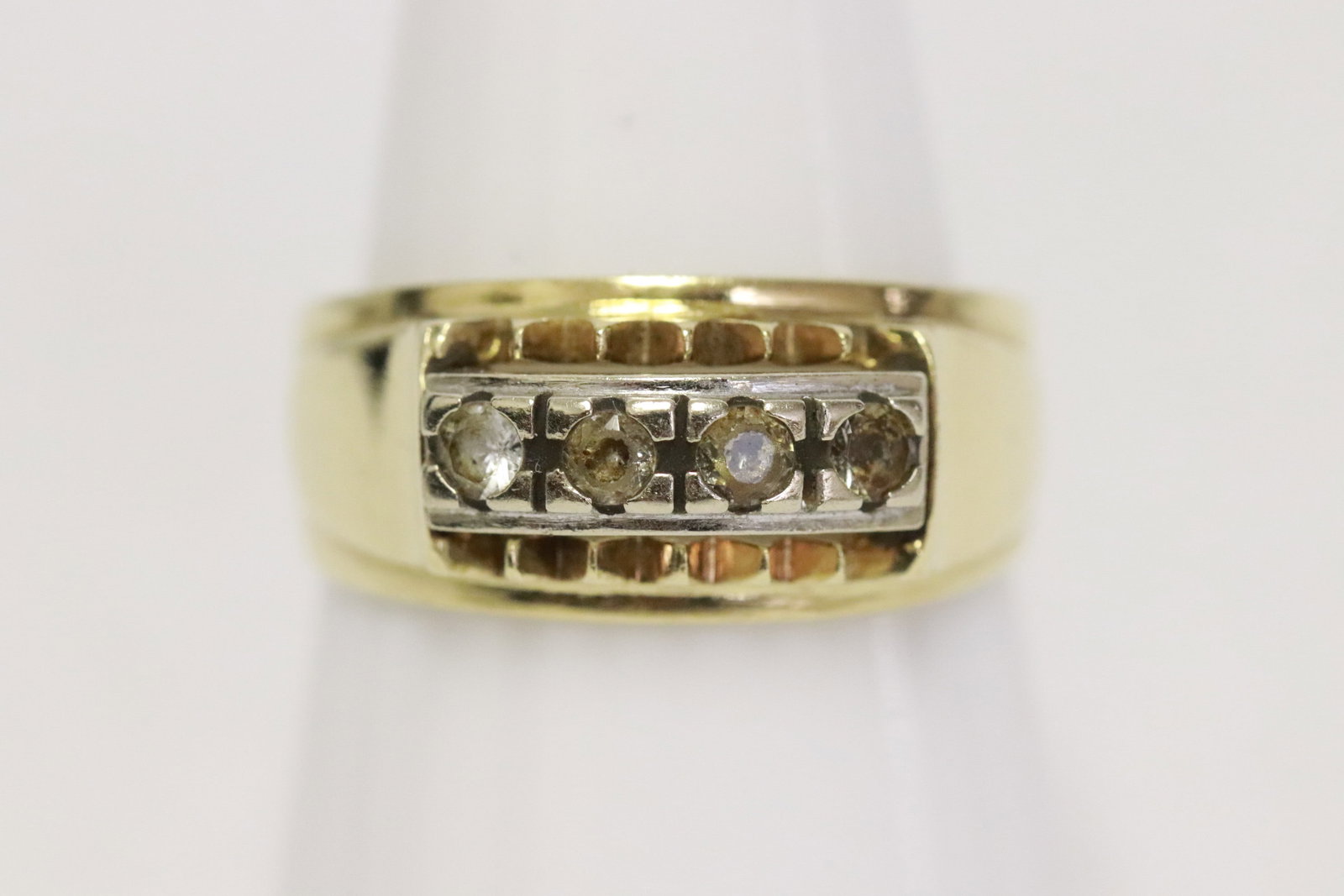 14K Y/G ring with clear stone: 14K Y/G ring with clear stone, clear stone NOT diamond, wt. 5.4gm, size 8.5