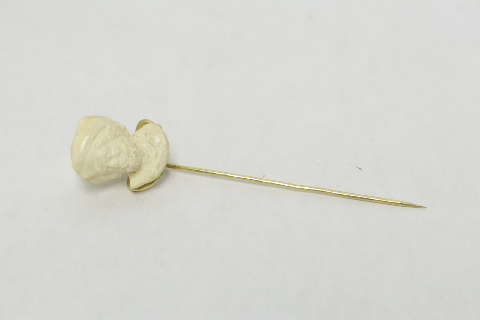 Victorian 14K stick pin w/ meerschaum cavalier: Victorian 14K stick pin (3"L) with hand carved meerschaum cavalier (0.82"x0.6"), wt. 4.1gm