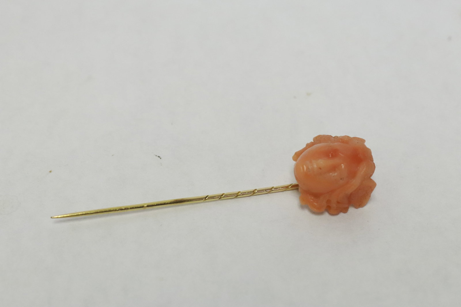 Victorian 14K Y/G stick pin w/ coral carving: Victorian 14K Y/G stick pin (2.65"L) with coral carving (0.62"x0.6") depicting lady's face, wt. 3.8gm, NO INTERNATIONALSHIPPING OF CORAL