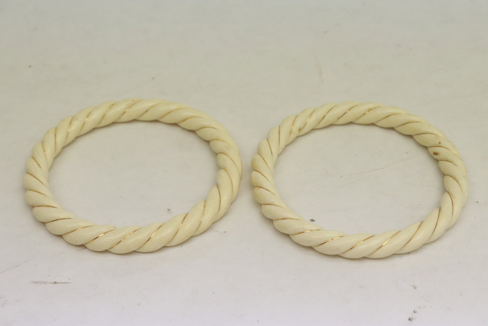 2 bone carved bangles with 14K Y/G wire (1 of 4)