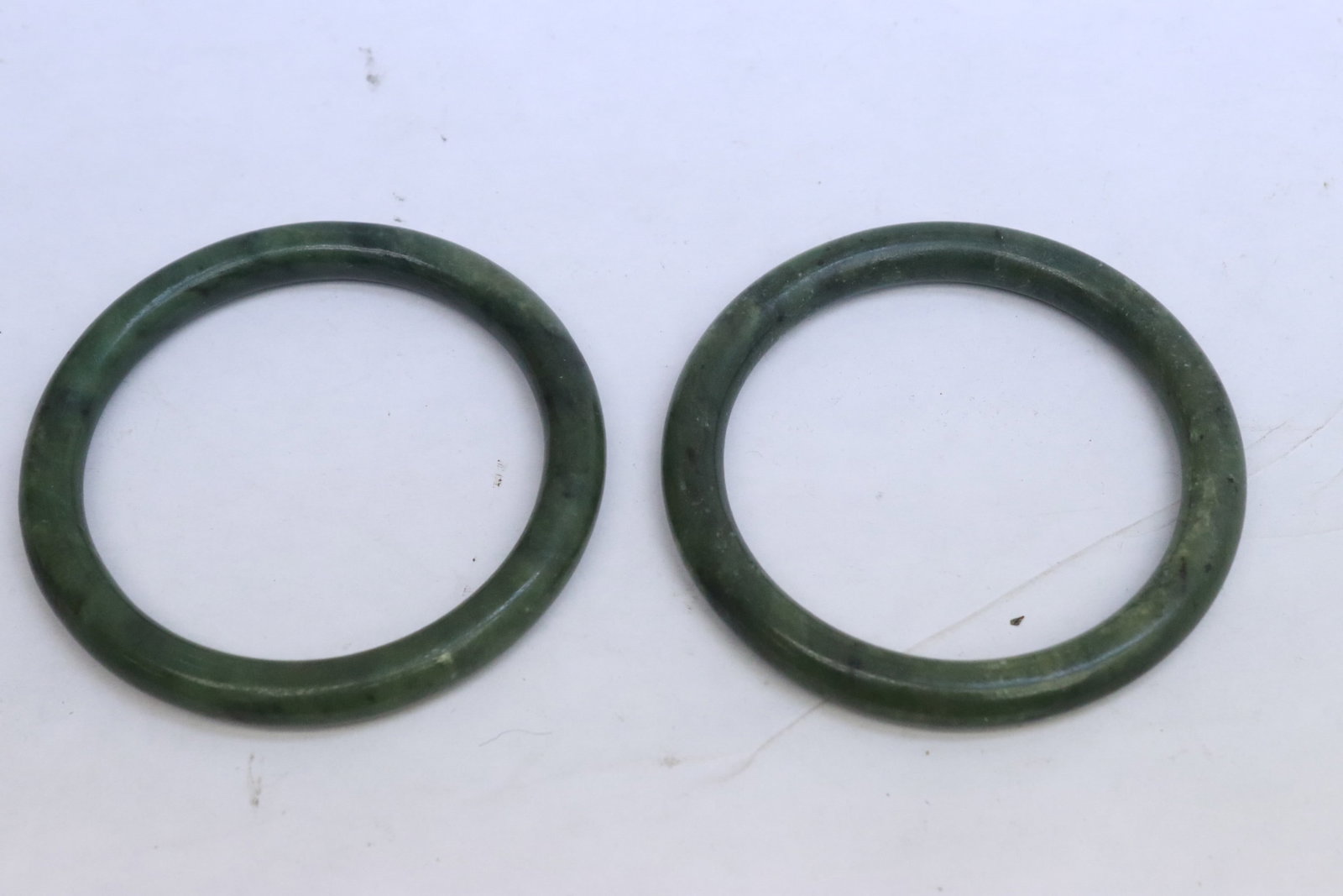 2 Chinese spinach jade bangles, and a bangle ring - 2