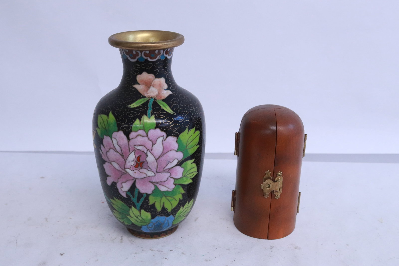 2 pieces; a cloisonne vase, and a wood shrine: 2 pieces; a cloisonne vase (6.2"x3.35"dia), and a wood shrine (4"x1"x4.3")