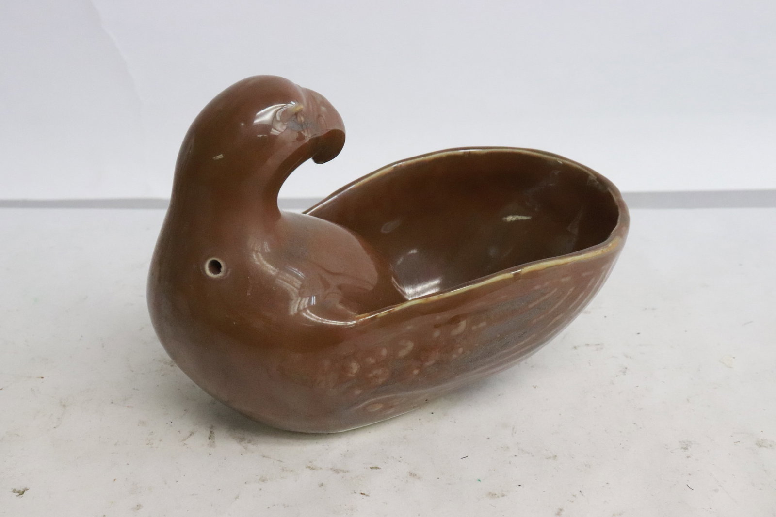 brown glazed porcelain brush wash: Unusual brown glazed porcelain brush wash in the form of bird, 3.6"x5"x2.8"