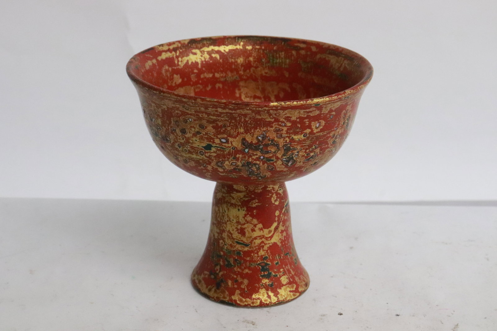 A gold on red stem cup: A gold on red stem cup, 3.45"x3.6"dia
