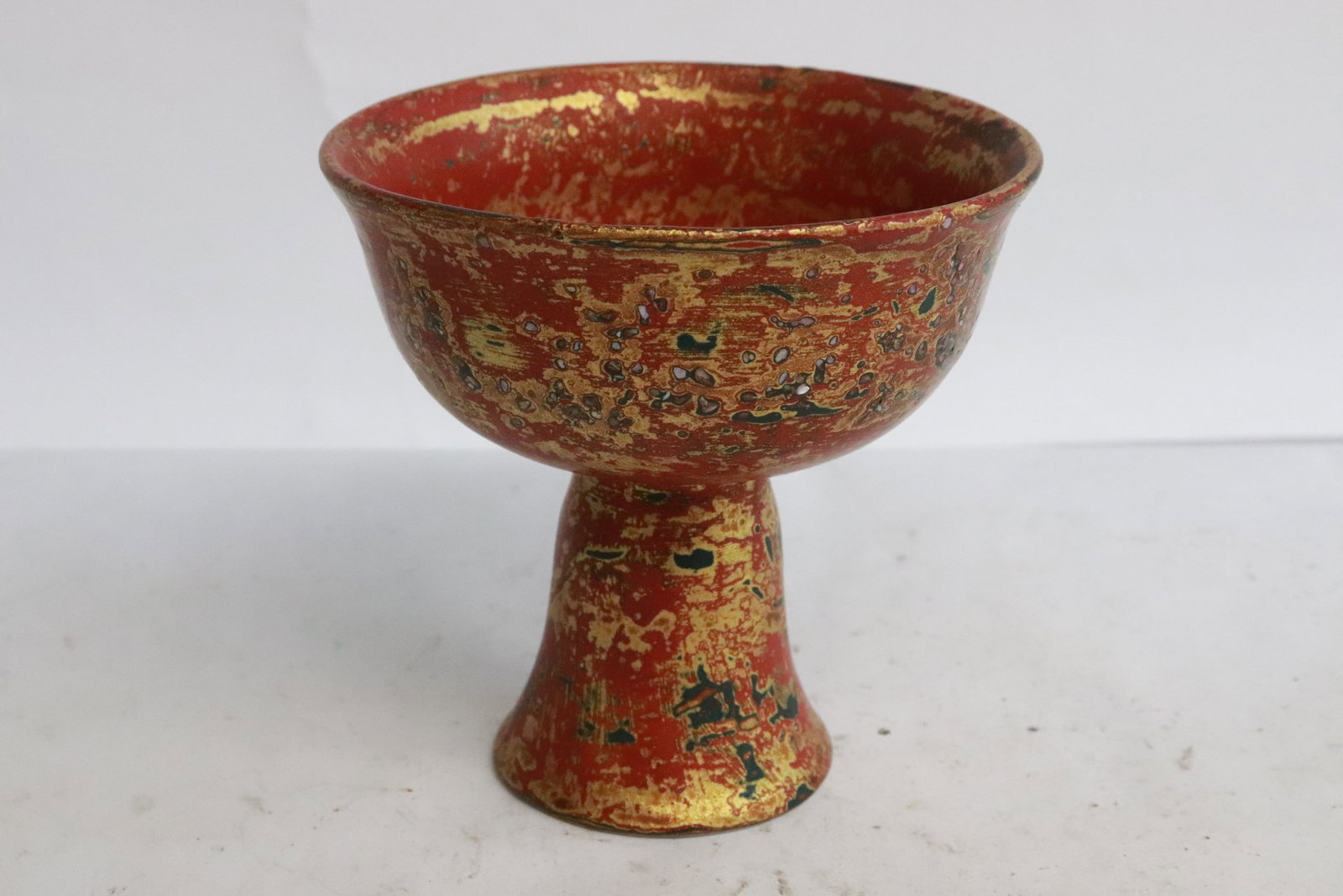A gold on red stem cup - 2