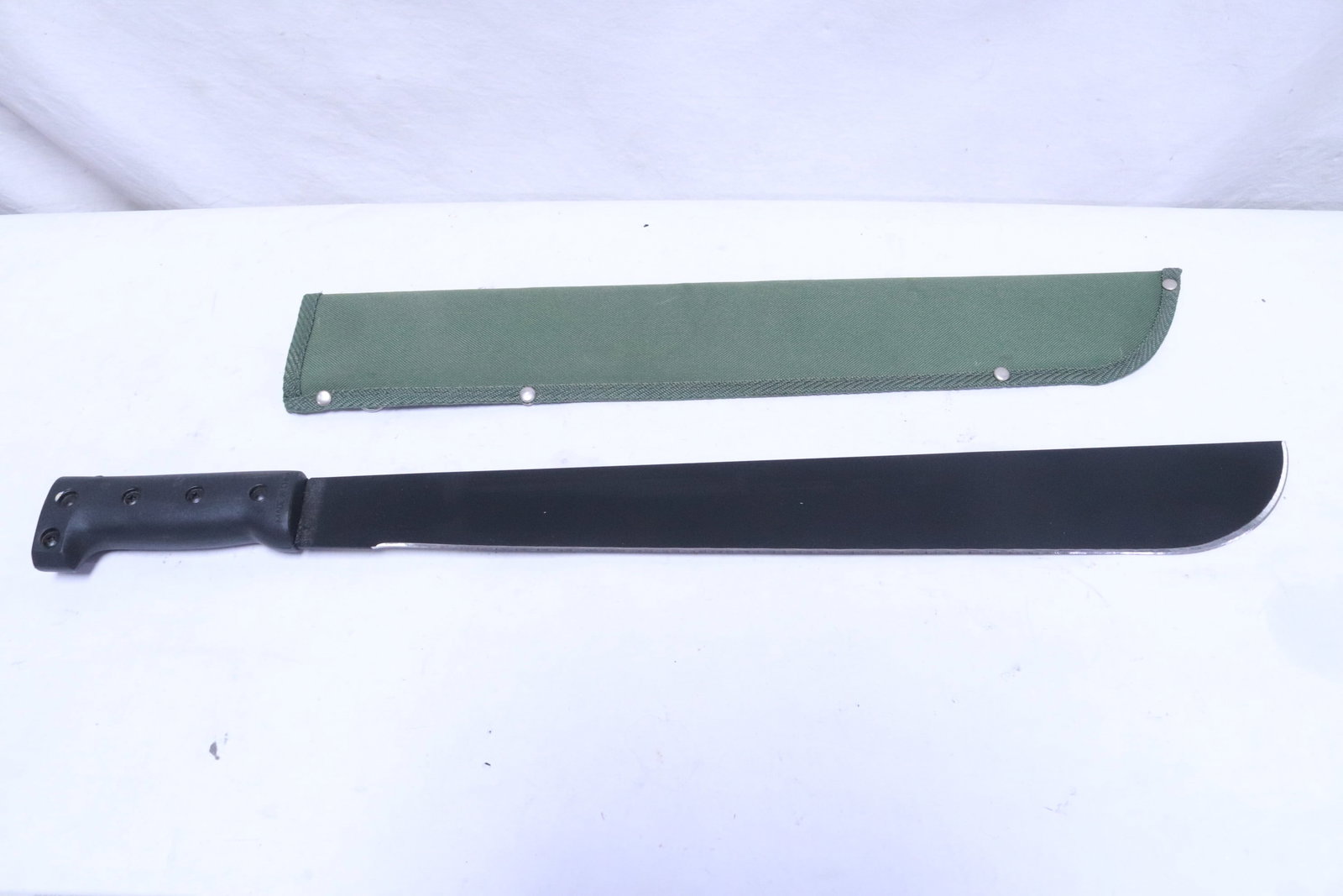 A machete, very sharp: A machete, very sharp, 22.35"L