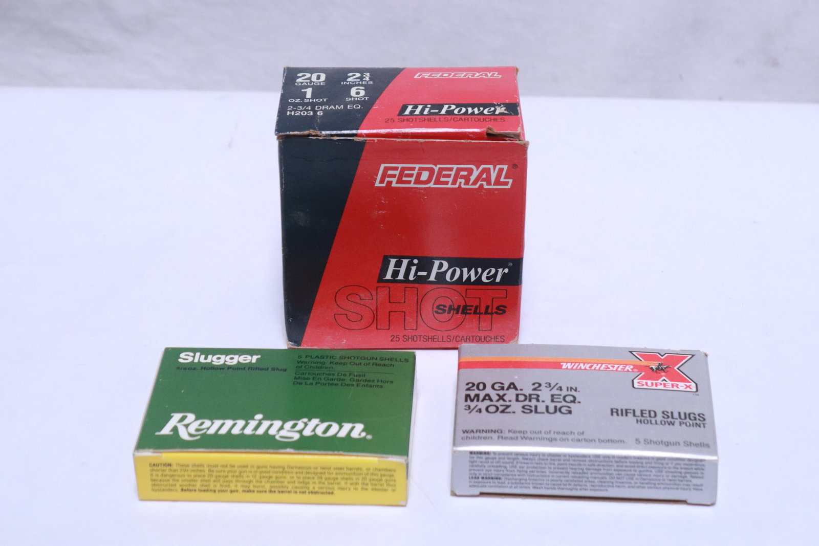 Two gauge 20 sluggers, & box gauge 20 shotgun shells: Two 5 round each gauge 20 sluggers, total 10 round, and box of federal high power gauge 20 shotgun shells, 25 rounds in box, NO shipping on this lot, local pickup only