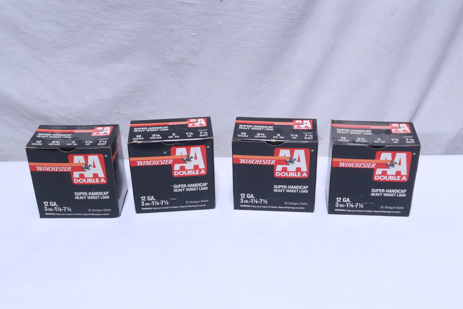 4 boxes AA gauge 12 shotgun shells: 4 boxes AA gauge 12 shotgun shells, total 100 rounds, NO shipping on this lot, local pickup only