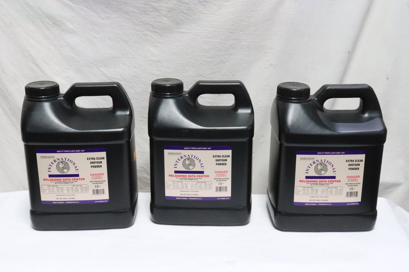 3 bottles Hodgdon International extra clean shotgun powder: 3 bottles of 8 lbs Hodgdon International extra clean shotgun powder, all containers appear to be as new with retailer stock and seal under lid, NO shipping on this lot, local pickup only