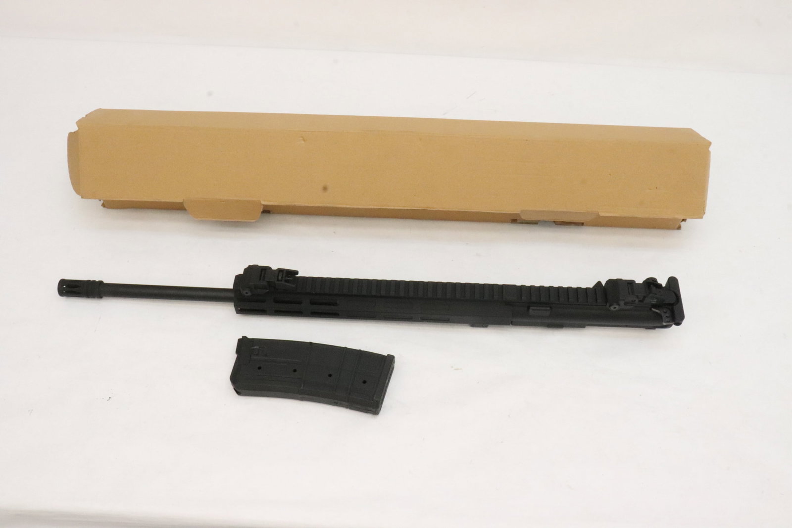 A 410 upper barrel with one 9RD magazine: A 410 upper barrel with one 9RD magazine