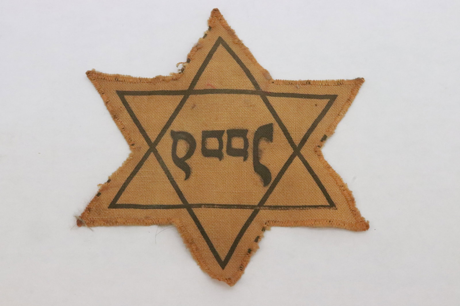yellow star of David badge for Dutch jewish people: A rare yellow star of David badge for Dutch jewish people, 4.65"x4.65"