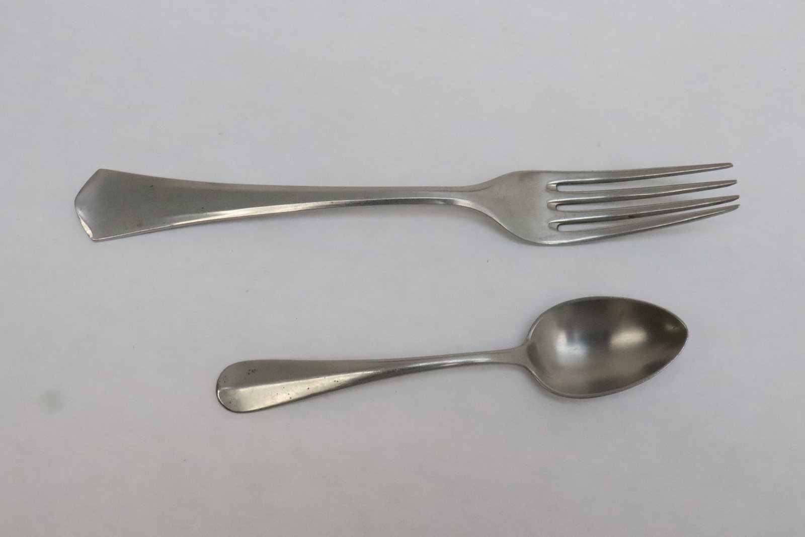 2 pieces German WWII utensils: 2 pieces German WWII utensils; a fork (8.35"L), and a spoon (5.7"L)