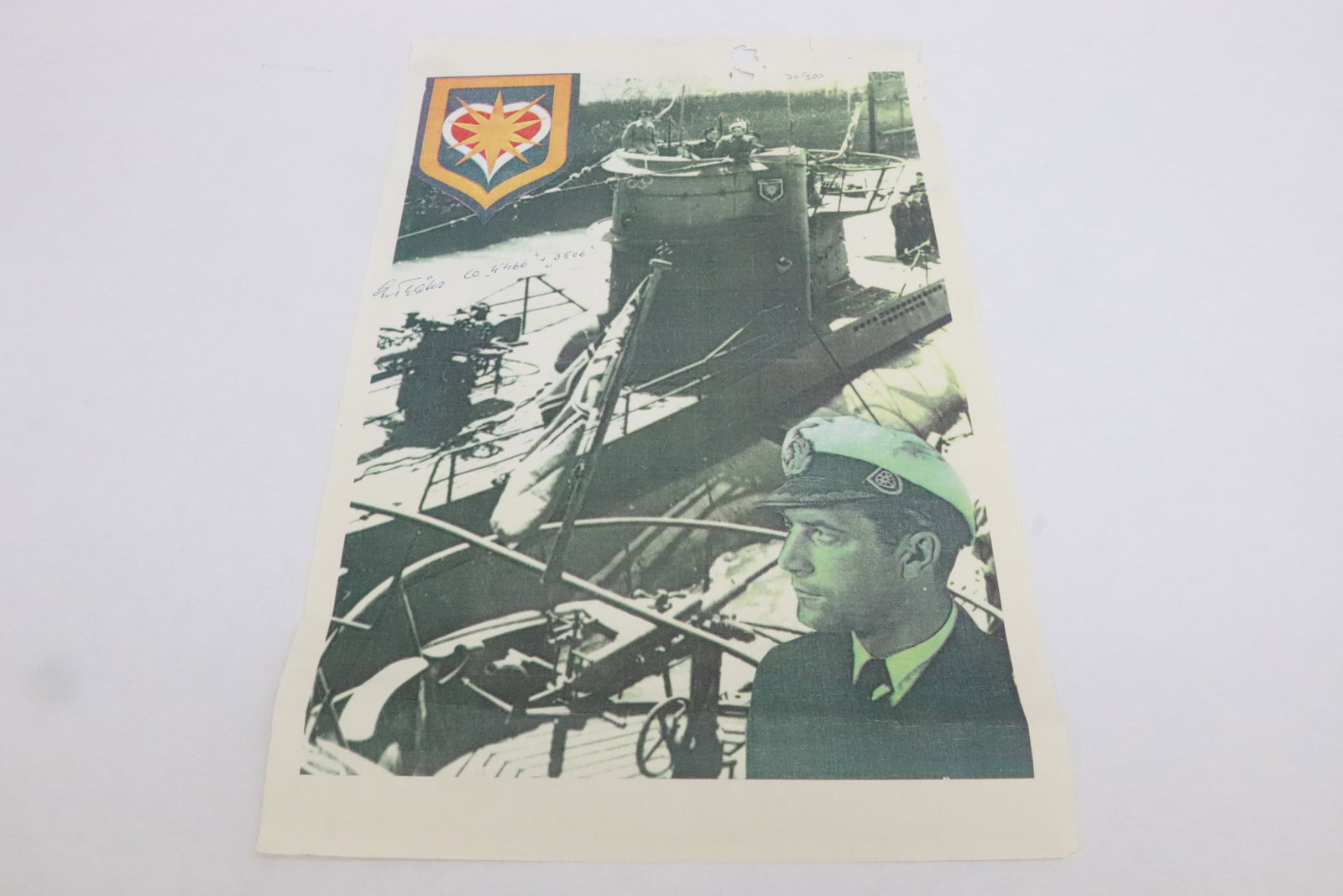 A limited edition of 30/300 print, signed: A limited edition of 30/300 print depicting a U-Boat submarine(?), signed, worm hole on top right, 17"x11"