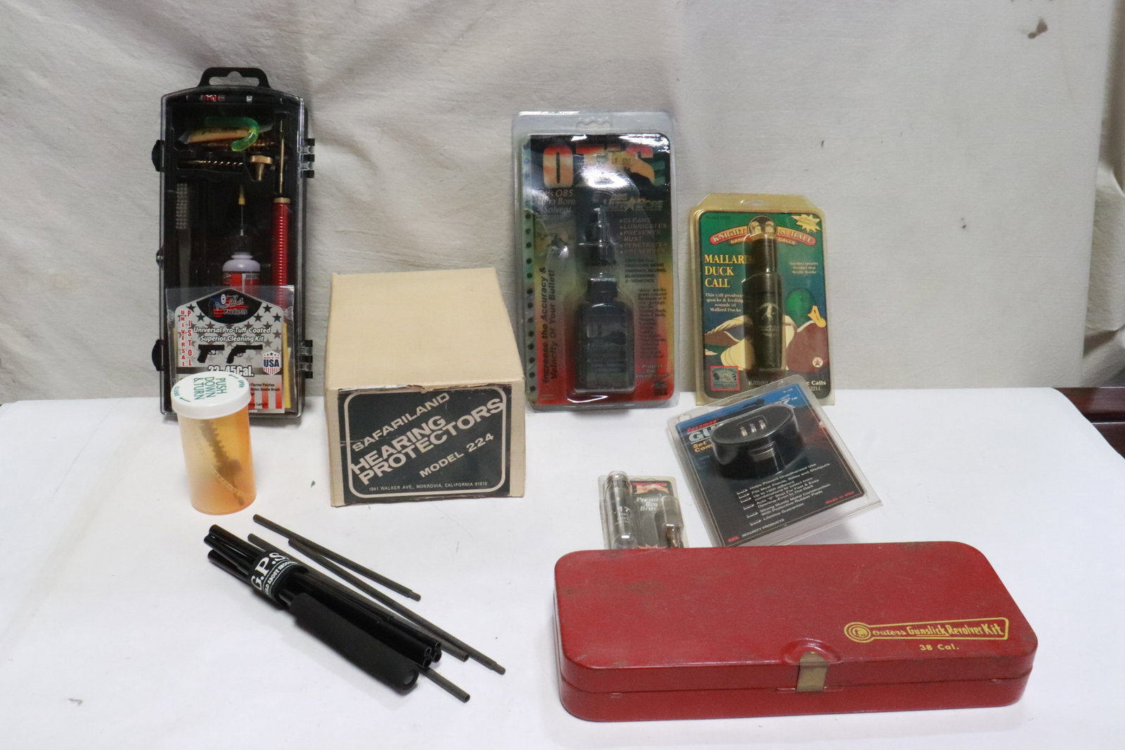Lot of gun cleaning tools, ear muff, etc.: Lot of gun cleaning tools, ear muff, etc.