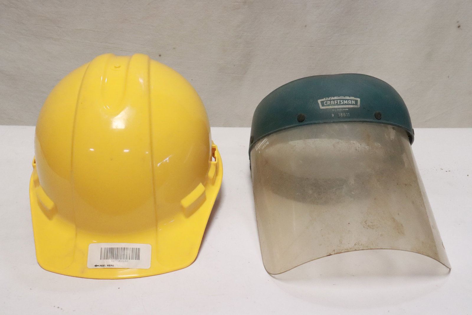 An industrial grade hard hat, & a Craftsman face shield (1 of 5)