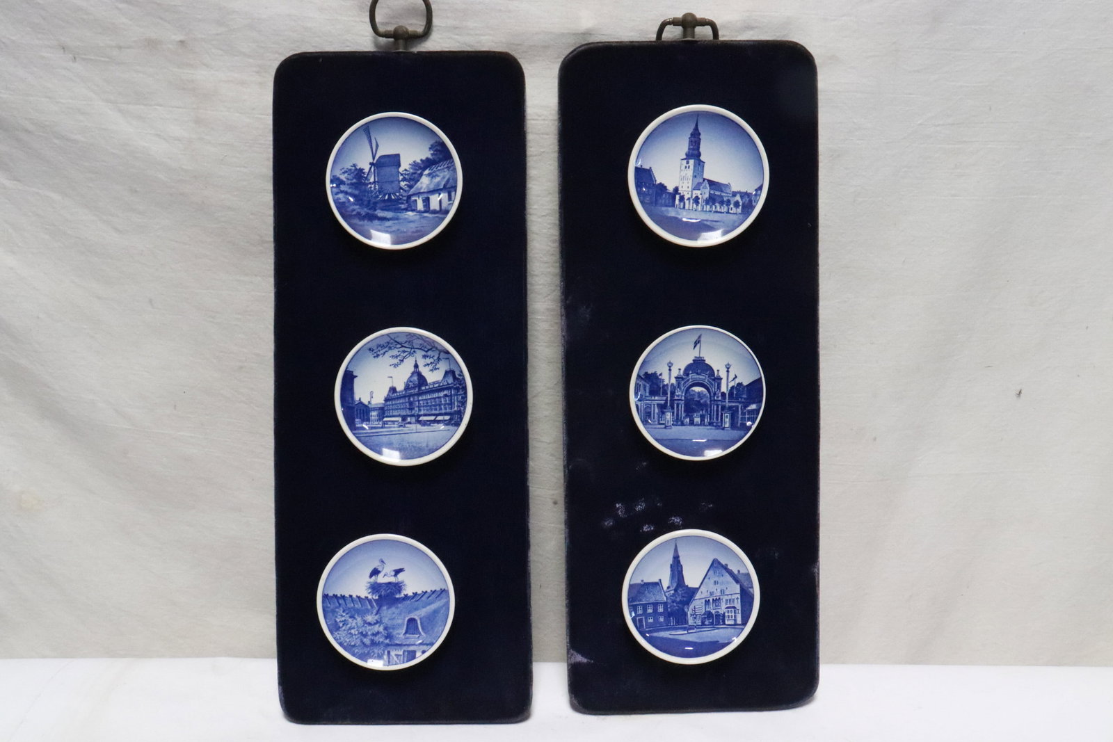 2 panels w/ 6 Royal Copenhagen miniature plates: 2 panels (16.2"x6.15"x1" ea) with 6 Royal Copenhagen miniature plates (0.5"x3.3"dia ea)