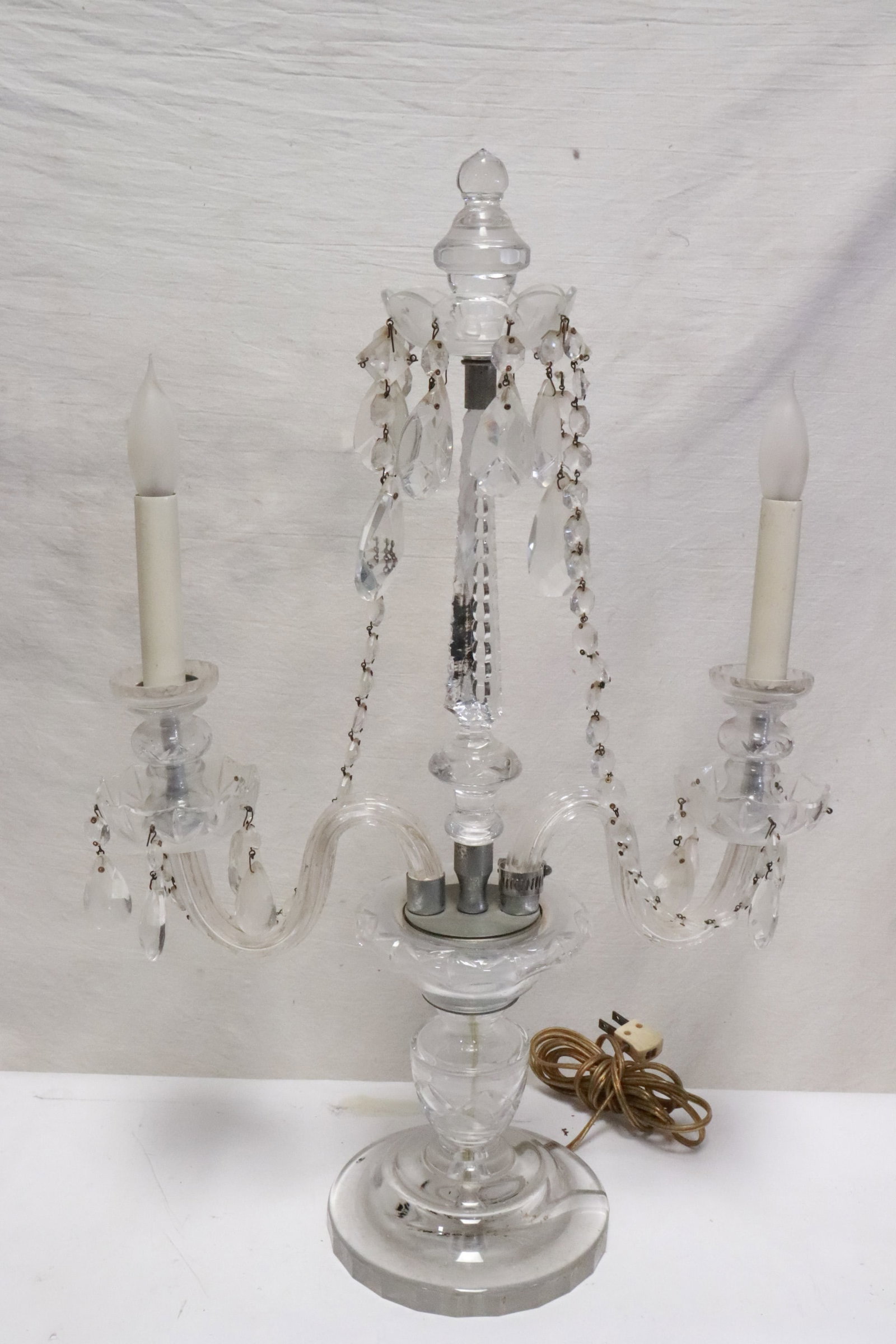 Crystal candelabra: Crystal candelabra (22.2"H), one crystal drop missing