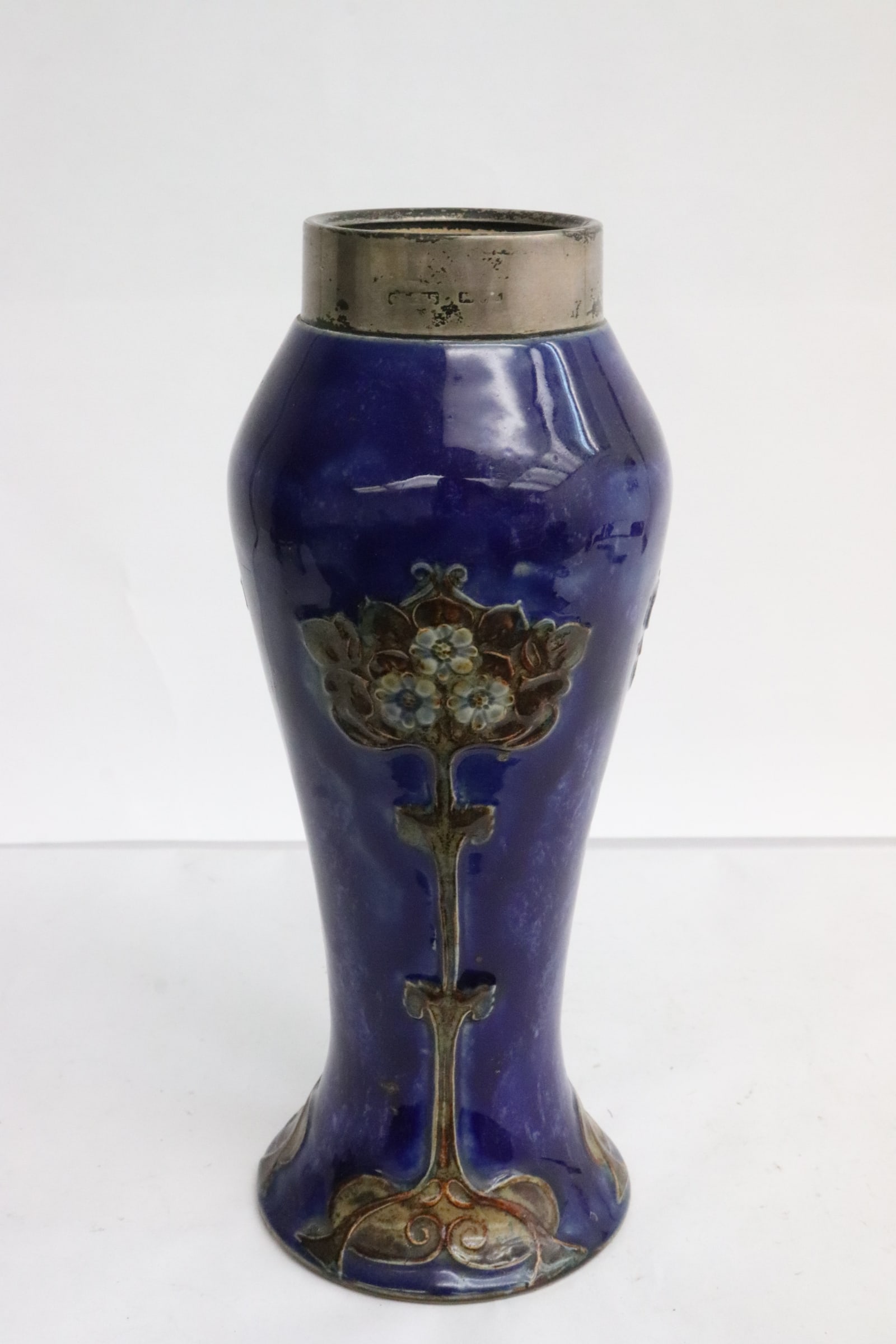 Royal Doulton stone ware jar w/ sterling top rim: Royal Doulton stone ware jar with sterling top rim (English sterling mark), and maker's mark on bottom, 8.25"x3.25"dia