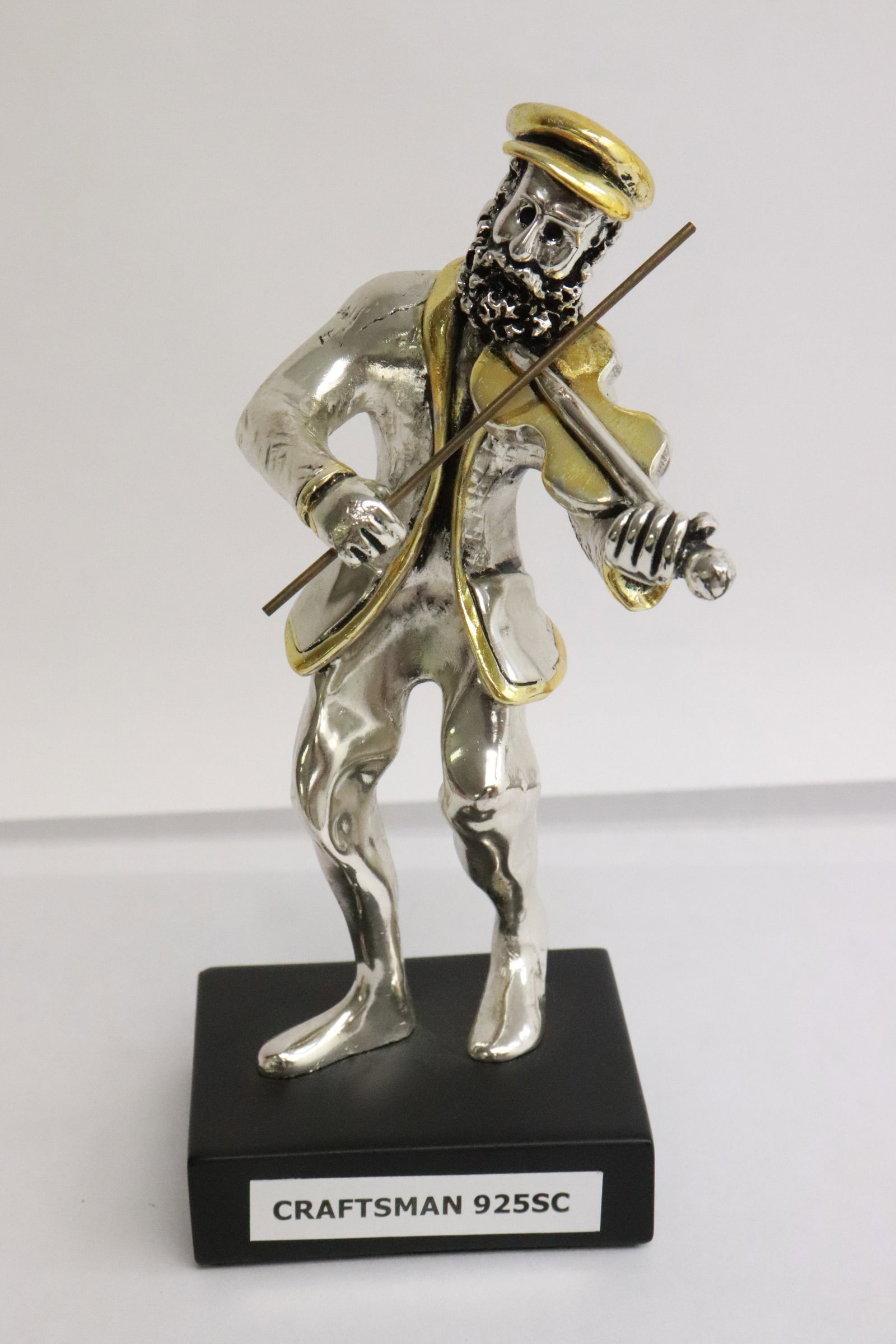 2 marked sterling musicians - 2