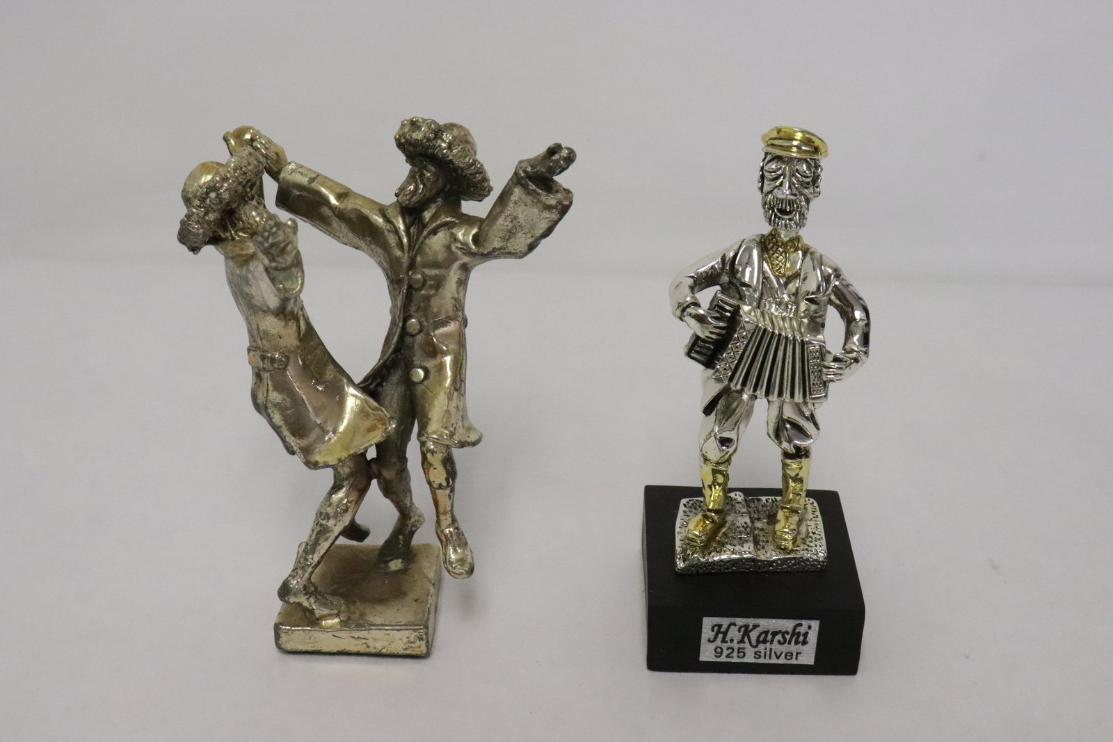 2 pc marked sterling arts; a musician, & pair of dancers: 2 pieces marked sterling arts; a musician (4.1"H), and pair of dancers (4.65"H)