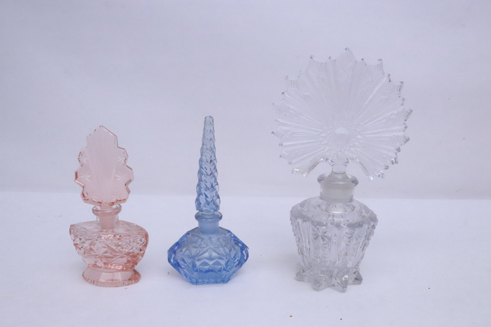 3 Czeckoslavakia perfume bottles: 3 Czeckoslavakia perfume bottles, 4.65"x1.5"x2.5" - 6.85"x3.9"x2.65"