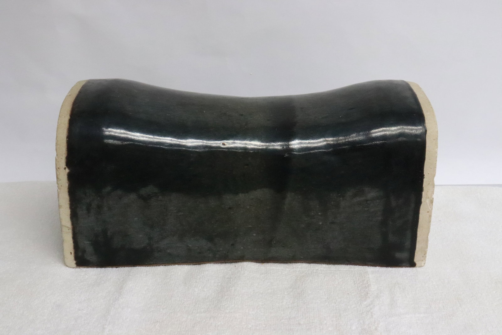 A black glazed earthenware pillow - 2