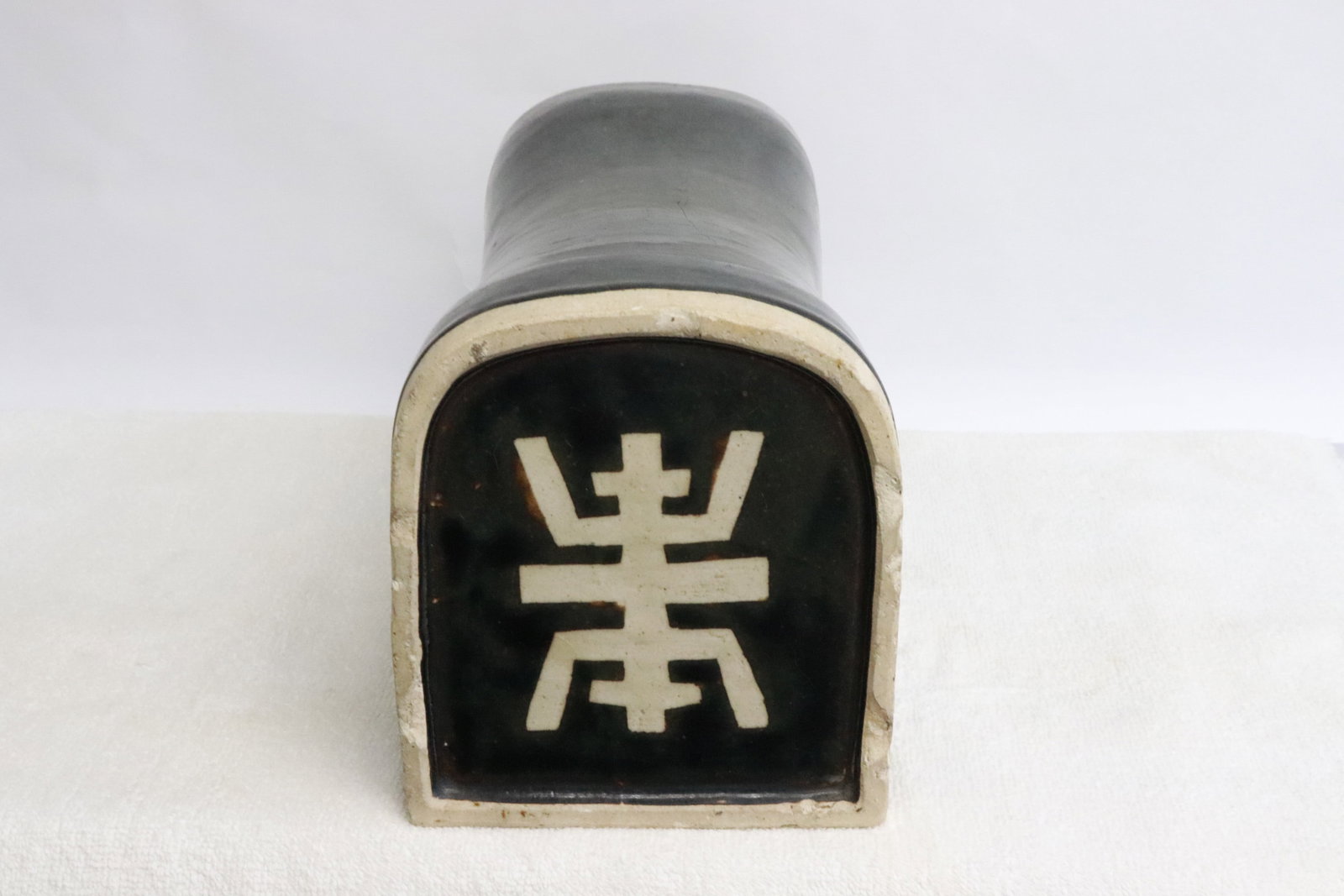 A black glazed earthenware pillow - 3