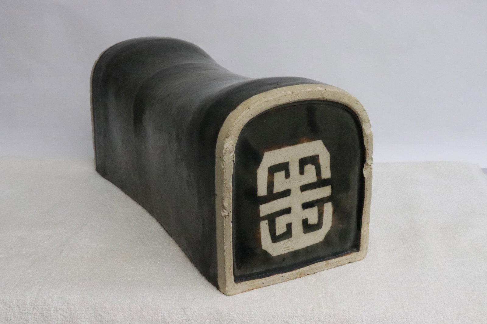 A black glazed earthenware pillow - 5