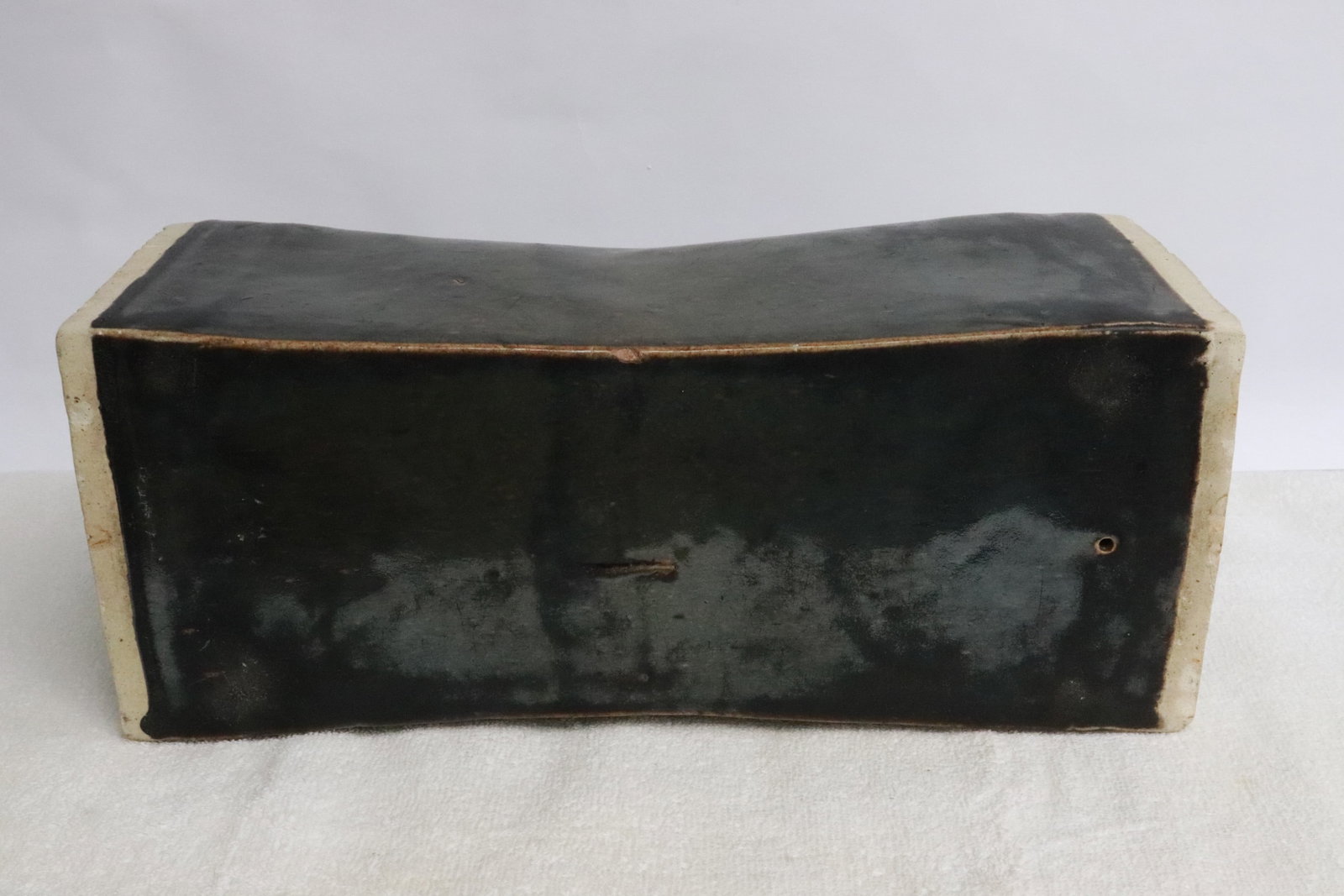 A black glazed earthenware pillow - 6