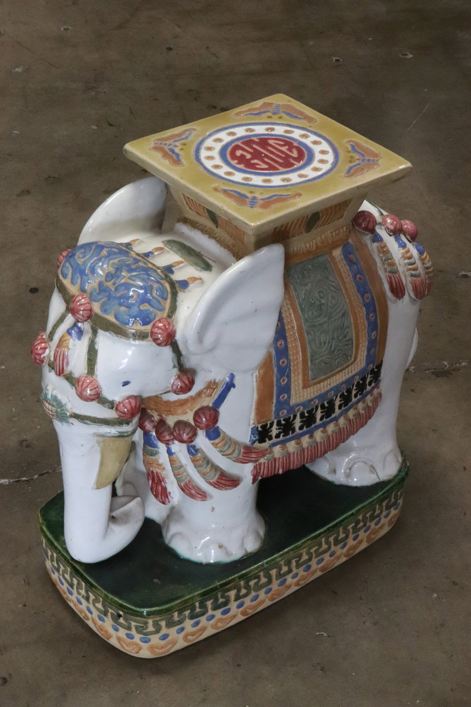 An elephant motif porcelain garden stool: An elephant motif porcelain garden stool, 22.4"H