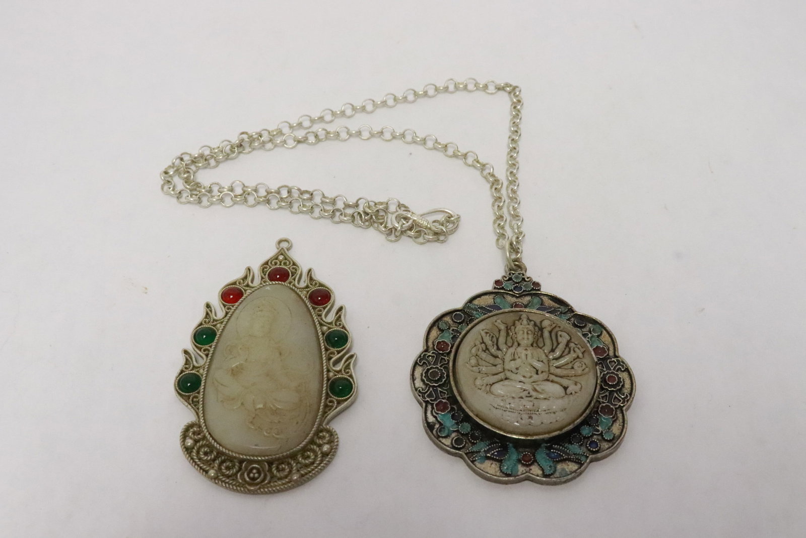 2 ornaments with jade like insert: 2 ornaments with jade like insert, 2.8"x2.35"x0.4", 3.3"x1.8"x0.3"