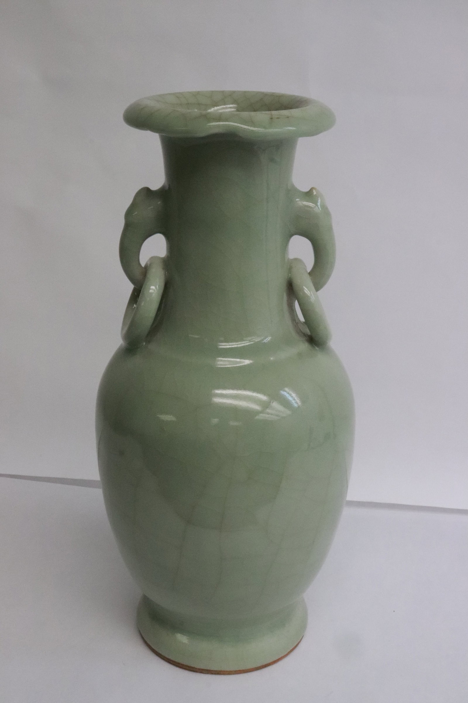 Chinese vintage celadon crackleware porcelain vase: Chinese vintage celadon crackleware porcelain vase, drilled and filled, 11.3"x5.3"dia