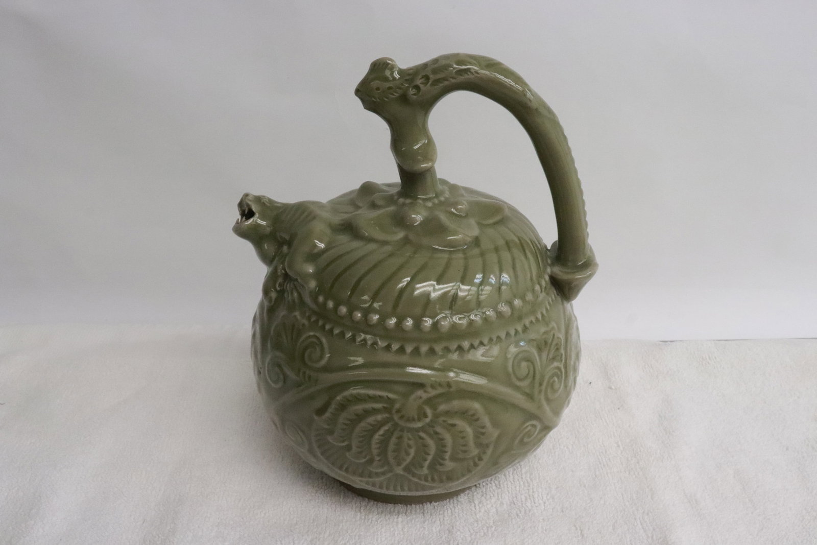 Chinese celadon porcelain teapot: Chinese celadon porcelain teapot, 7.3"x5.85"x5.7"