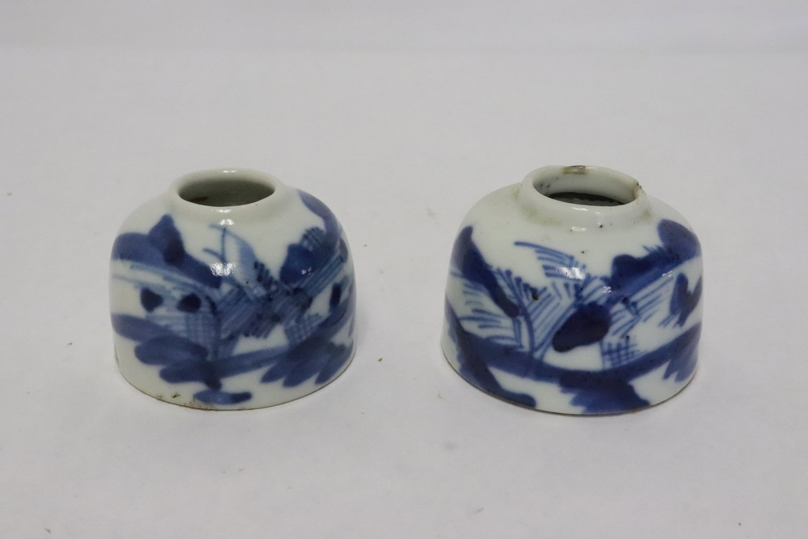 2 Chinese antique blue and white water drippers: 2 Chinese antique blue and white water drippers, one top trim flea bites, 1.65"x2.1"dia, 1.65"x2.3"dia