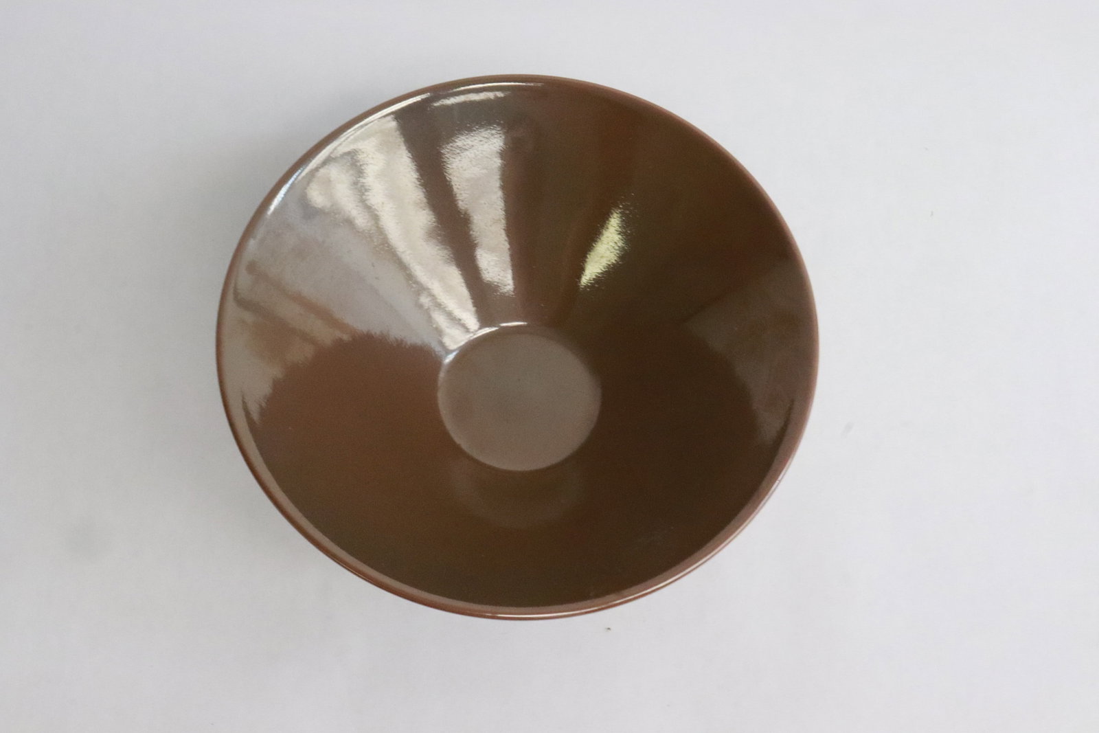 A brown glazed porcelain bowl (1 of 5)