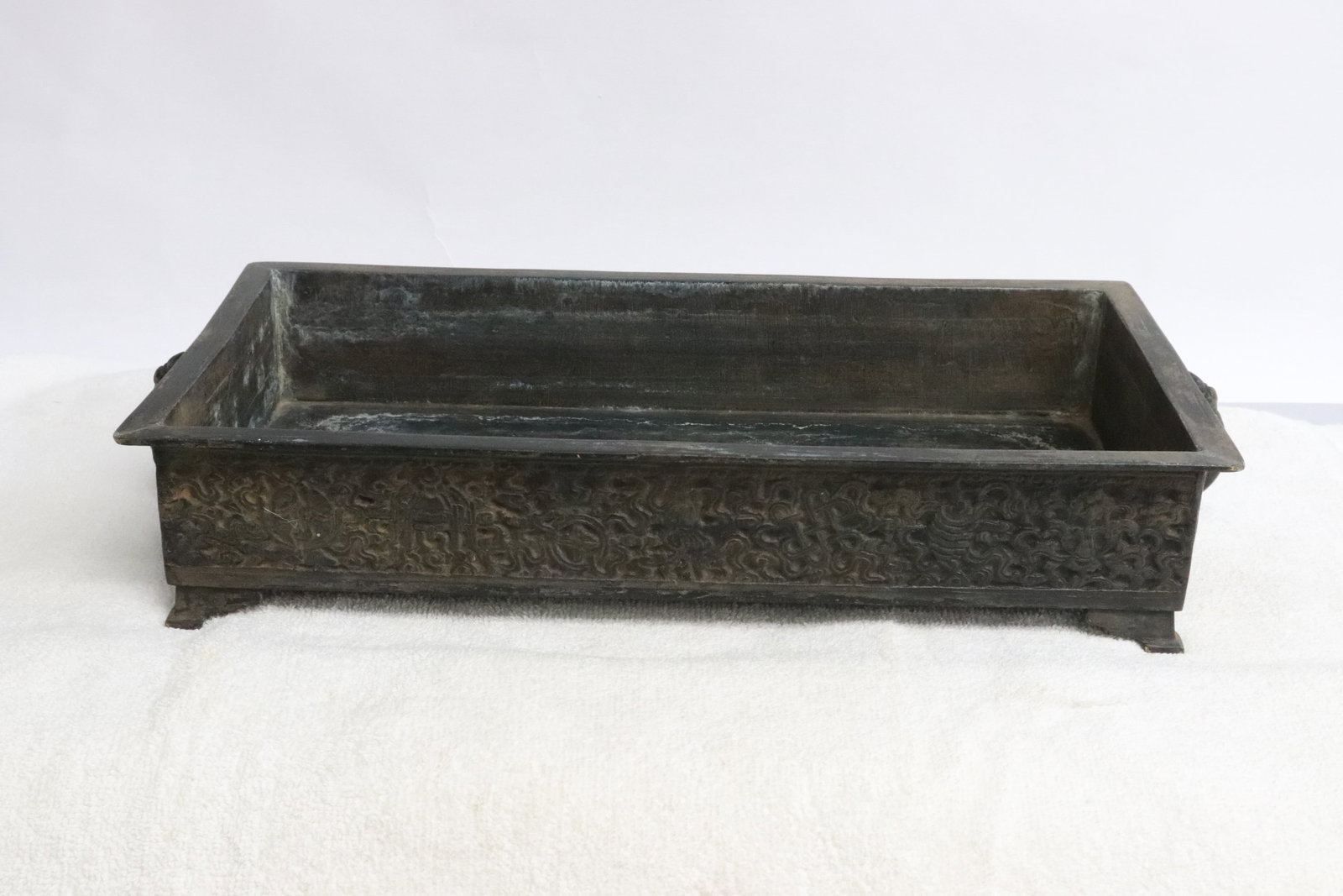 Antique Chinese bronze rectangular planter: Antique Chinese bronze rectangular planter decorated with 8 treasure items in relief, 2.8"x15"x7.15"