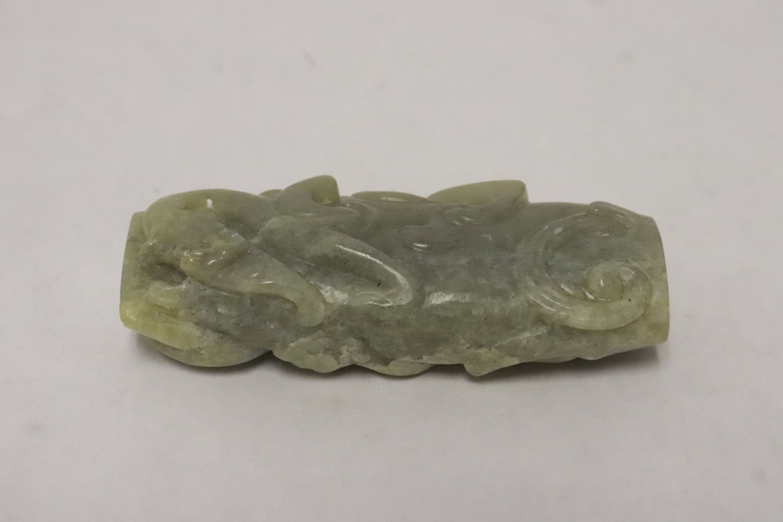 A celadon jade carved ornament (1 of 5)