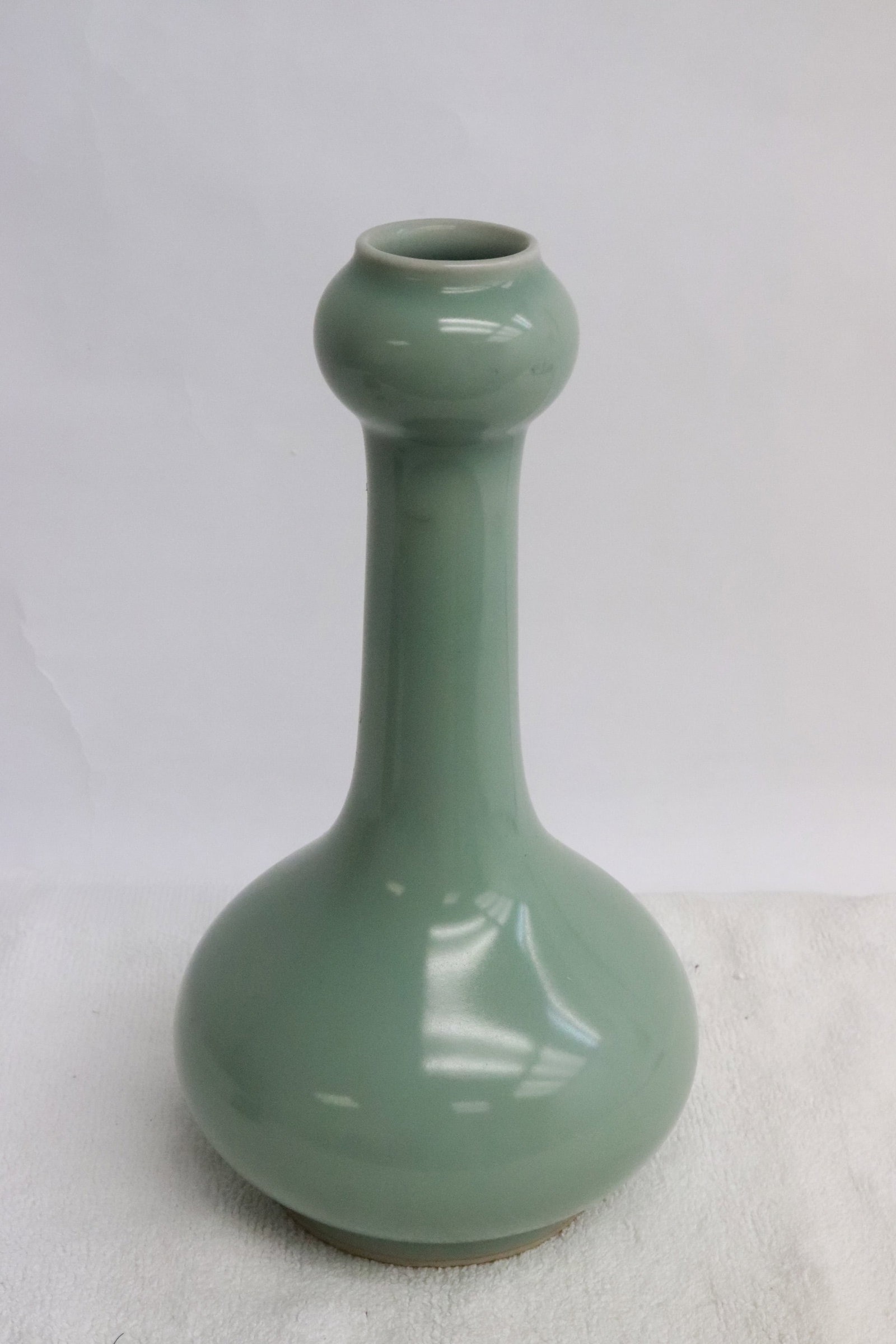 A celadon porcelain garlic top vase (1 of 5)