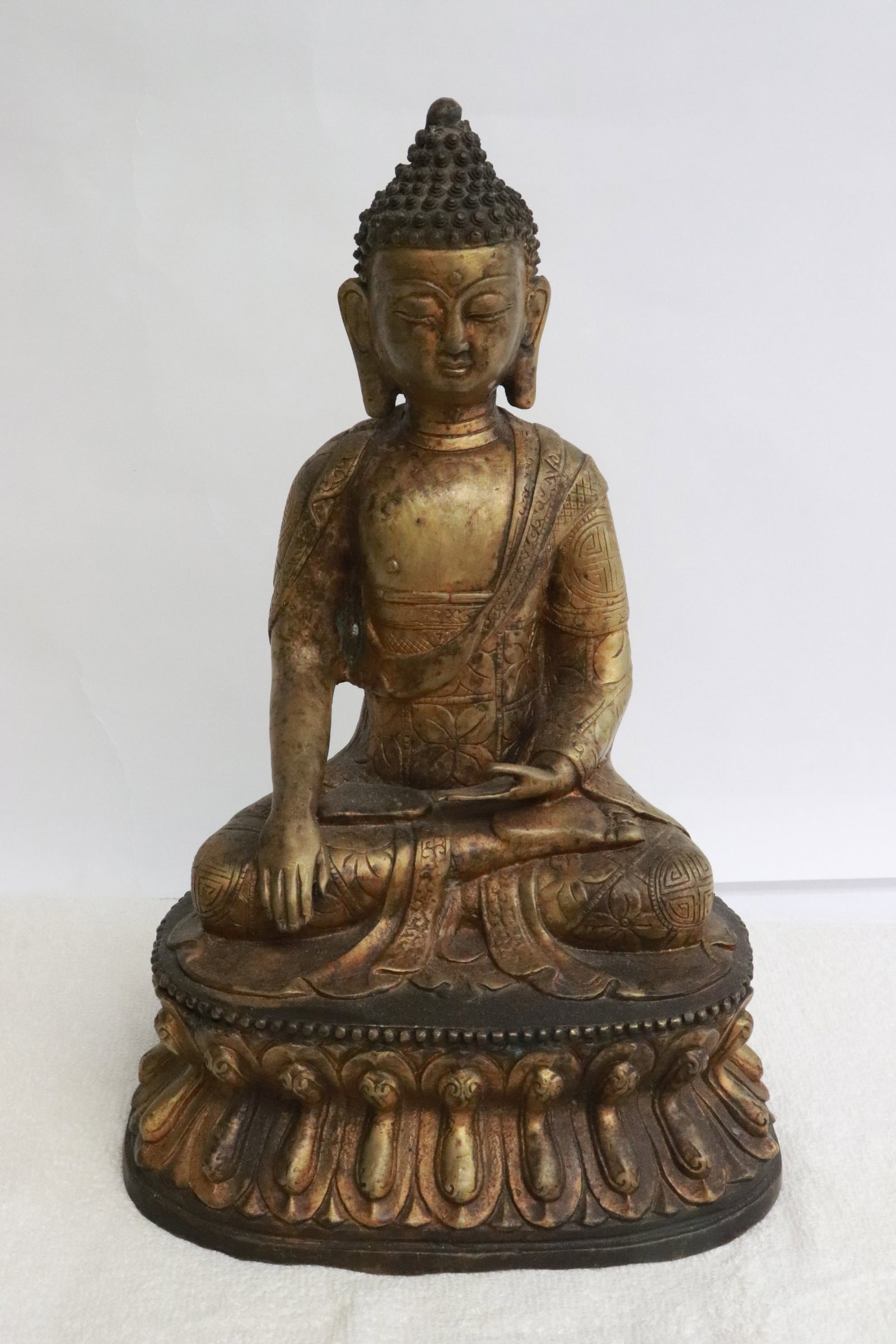 Chinese parcel gilt bronze sculpture of deity w/ mark: An important Chinese parcel gilt bronze sculpture of deity with mark on lower back, 11.15"H