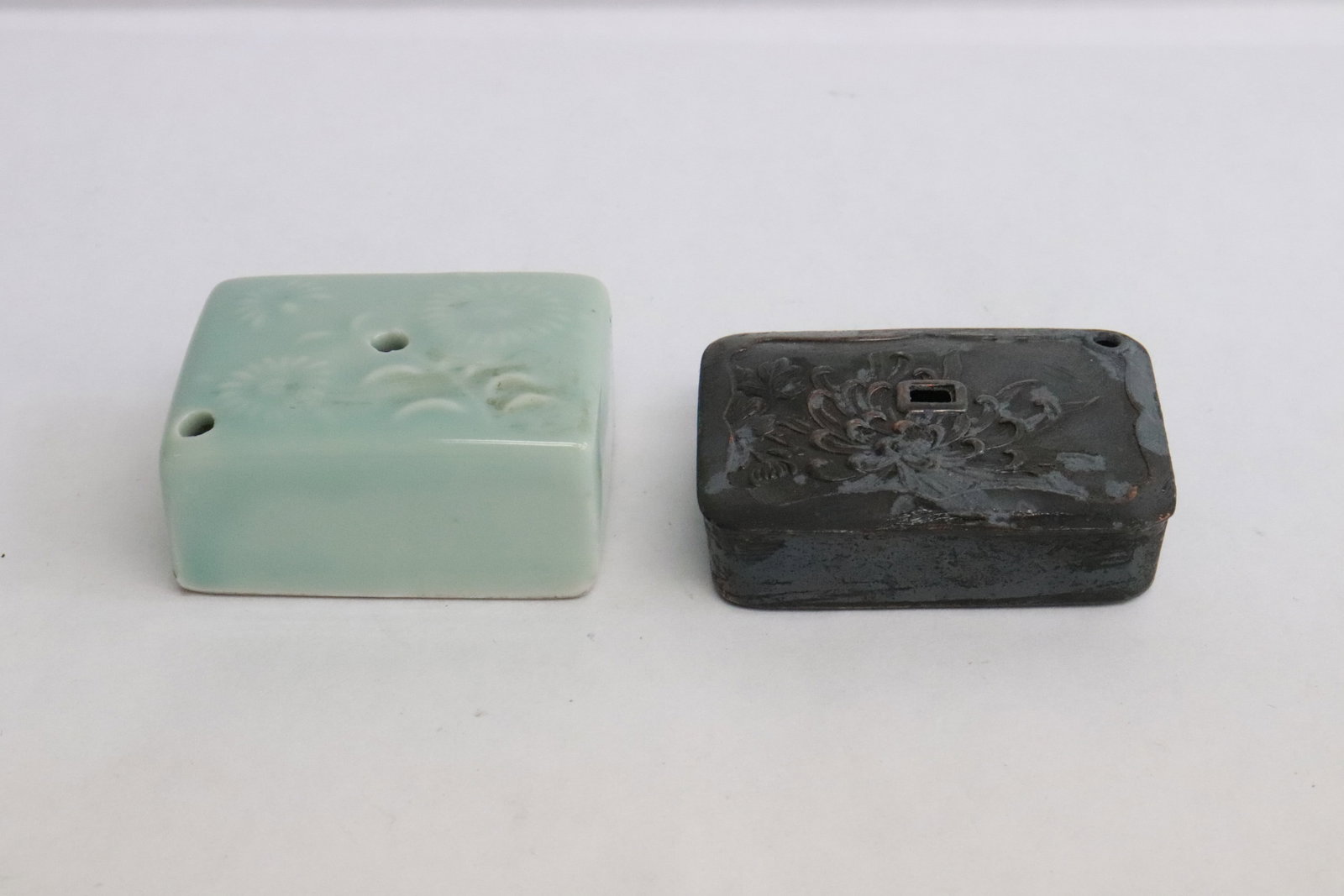 2 vintage water drippers; one copper: 2 vintage water drippers; one copper (0.75"x2.1"x1.6"), one celadon porcelain (possible Korean antique) (1.05"x1.83"x1.4")