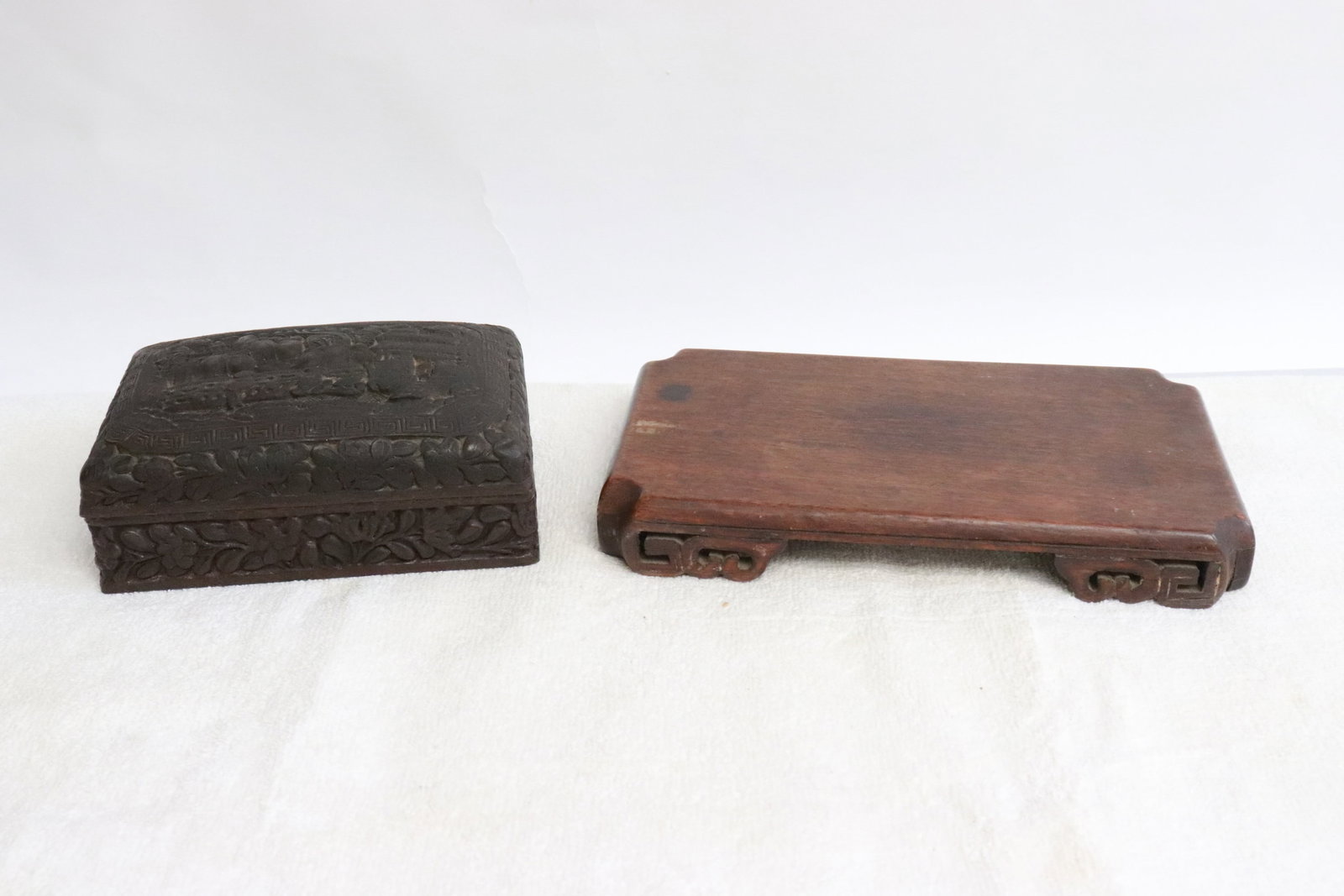 2 pieces; a cinnabar style box, and a wood stand: 2 pieces; a cinnabar style box (2.35"x5.6"x3.8"), and a wood stand (1.1"x8.3"x4.75")