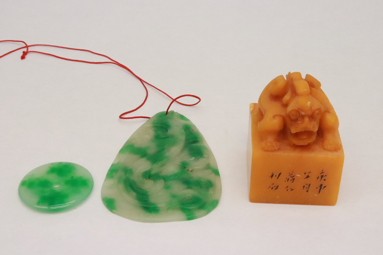 2 jade like ornaments, & a shoushan stone style seal: 3 pieces; 2 jade like ornaments (0.25"x2.1"dia, 4.9"x3.33"x0.2"), and a shoushan stone style seal (3.4"x2.3"x2.35" (box4"x4.6"x4.7"))