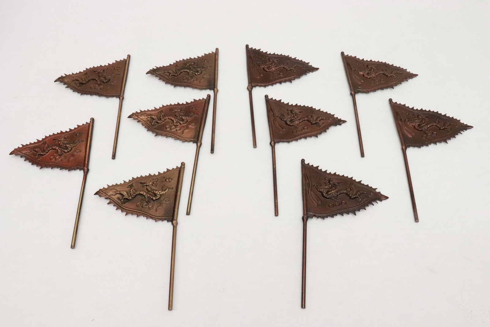 Lot of bronze flags (1 of 7)