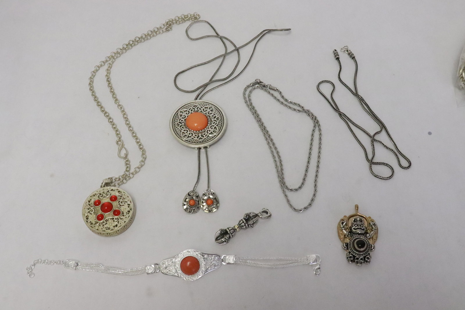 Lot of ornaments, necklaces, etc.: Lot of ornaments (1.7"L - 0.6"x2"dia), necklaces, etc.